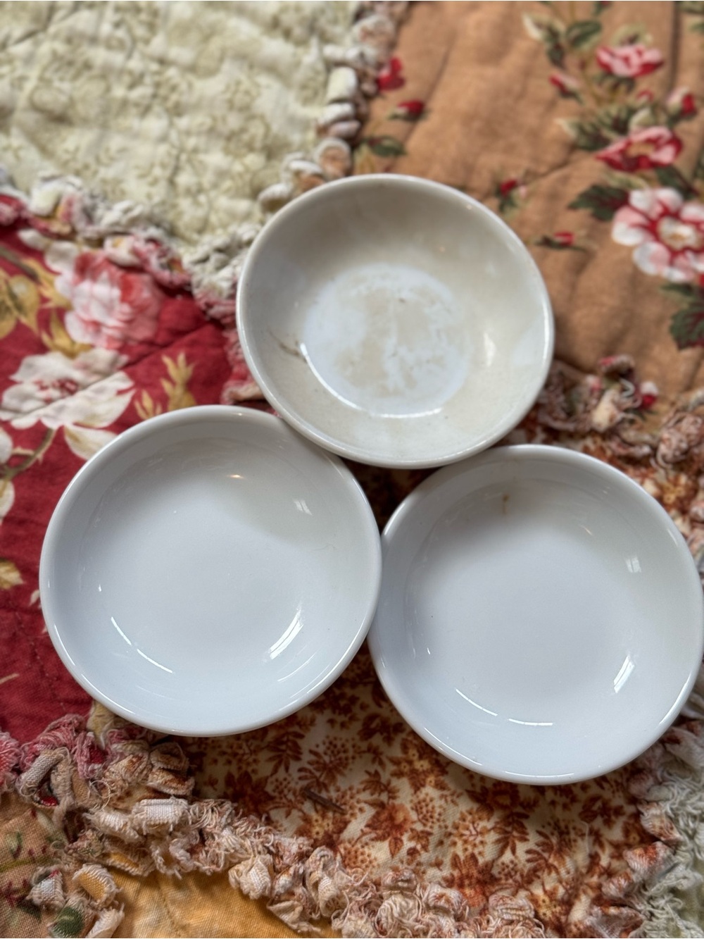 A Stack of 3 Chunky White Ceramic Butterpats